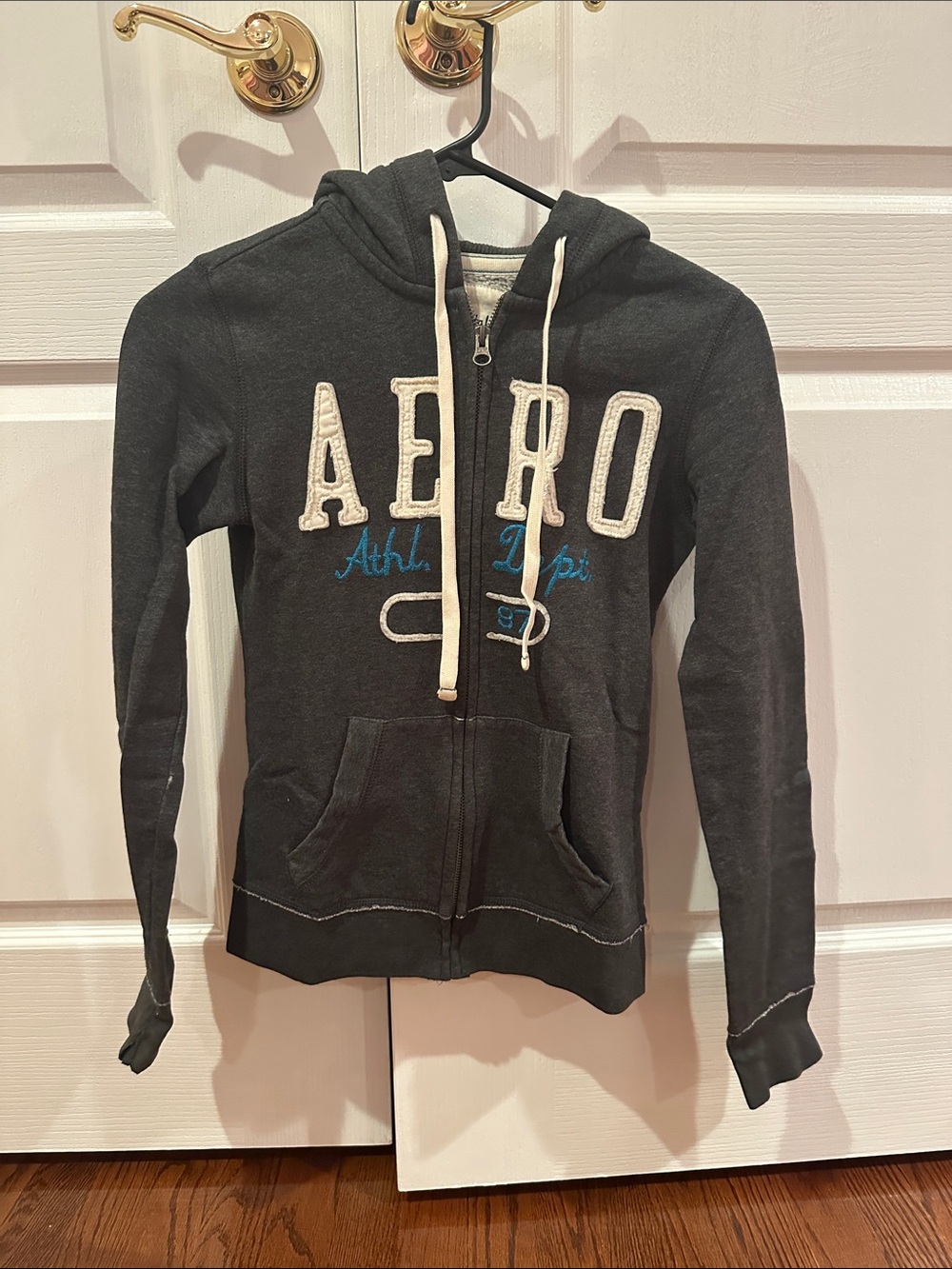 Aeropostale charcoal gray zip-up hoodie with white drawstrings